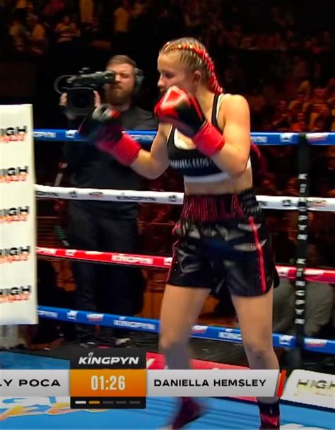 boxer flashes audience|Boxer Daniella Hemsley celebrates win by flashing crowd